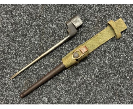 WW2 British No4 Bayonet and scabbard. Complete with webbing frog and with rare leather and brass retaining clip.