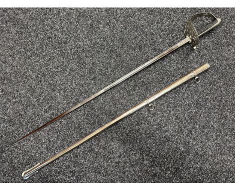 British Royal Military College Presentation Sword with single edged fluted blade 820mm in length with etched decorated panel 