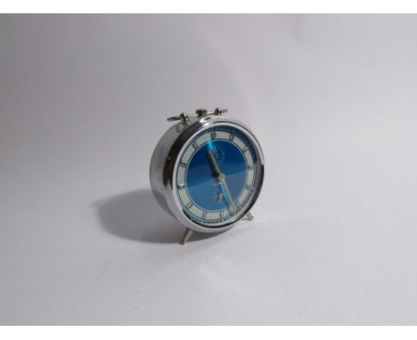 A Coral Vintage alarm clock, blue face, 14cm tall 