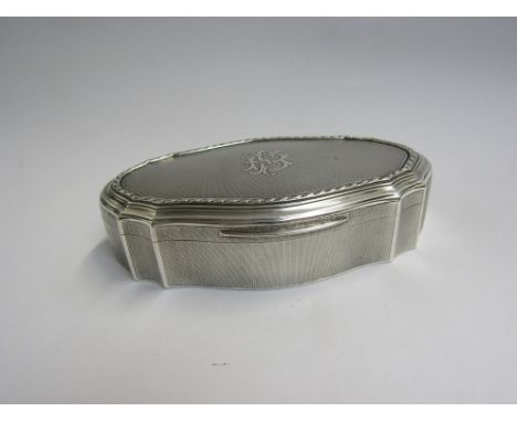 An Elkington &amp; Co Ltd silver jewellery box of shaped form with engine turned detail, monogrammed top, London 1910, 3.5cm 