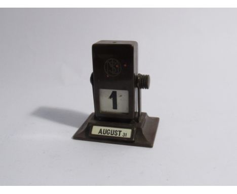 A vintage perpetual rotary rollover desk calendar of Art Deco form, 9cm tall 
