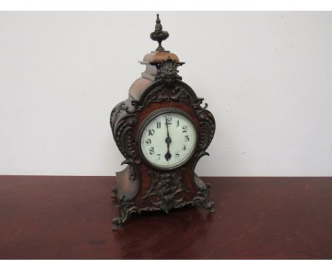 A French walnut mantel clock with Lenzkirch movement.  35cm tall 