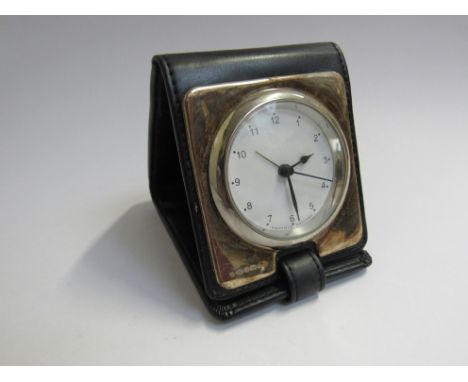 A Carr's of Sheffield silver framed travel clock in leather case, Sheffield 2014