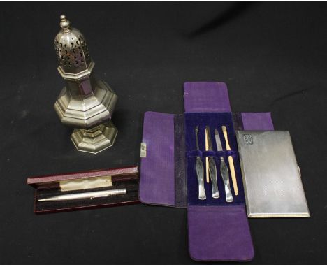 A large Continental silver sugar sifter, marked .925, together with a Birmingham silver engine turned cigarette case, a silve