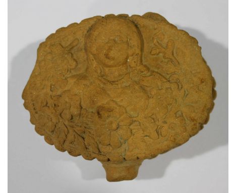 An unusual antique terracotta oil lamp, moulded in relief with a girl surrounded by flowers, AF