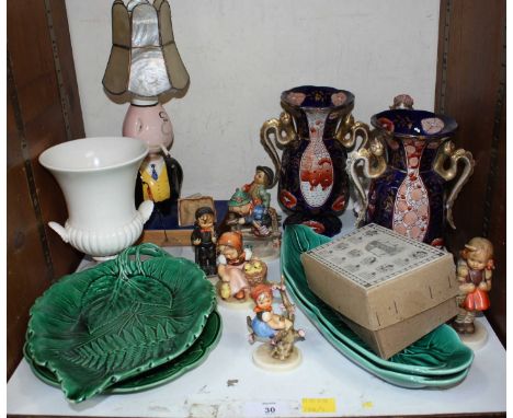SECTION 30. A collection of Goebel figures of children, together with Wedgwood campagna urn shaped vase, a Royal Worcester po