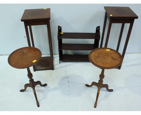 A small pair of mahogany tripod wine tables, together with a pair of cut-down Edwardian mahogany torchere stands, and a small