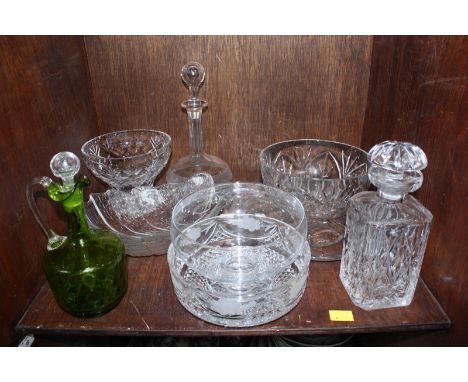 SECTION 38. A shelf of assorted glassware including three decanters, glass bowls and dishes