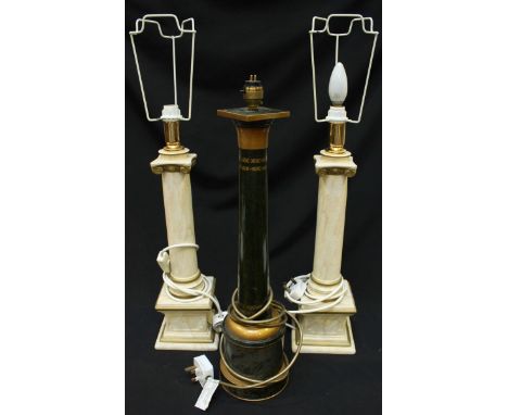 A pair of ceramic marble effect column table lamps, together with a green painted toleware table lamp. (3)