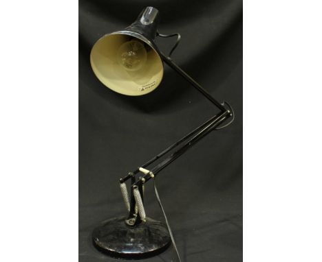 An Anglepoise table lamp together with a small metal mirror with strapwork- embossed frame