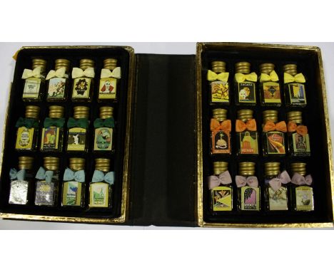 A collection of 24 vintage miniature perfume bottles by 'Borsari', all housed and displayed in a case modelled as a book