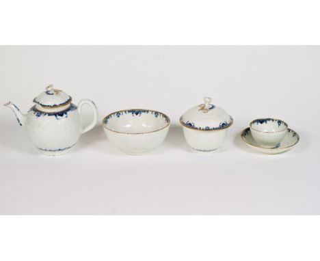 A WORCESTER BLUE AND WHITE PART TEA SERVICECirca 1765-70Painted with `The Chrysanthemum' pattern inside gilt line borders, co