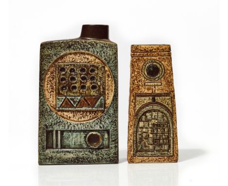 TWO TROIKA POTTERY VASES1970'sEach moulded with geometric panels, the first a chimney vase by Avril Bennett, the second a cof