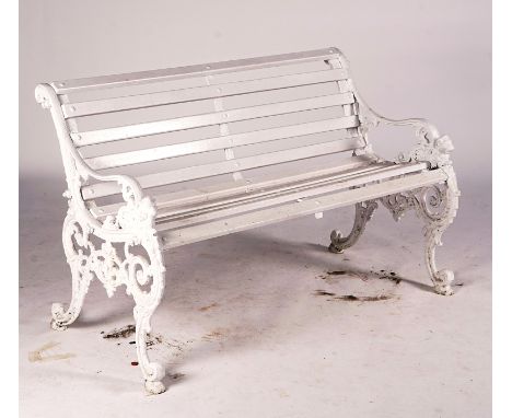 ANDREW McLAREN &amp; Co; A 19TH CENTURY WHITE PAINTED CAST IRON GARDEN BENCHWith lions’ head finials 130cm wide; 82cm high