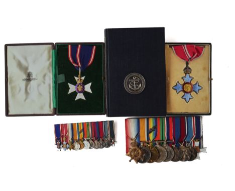 A GROUP OF ELEVEN DECORATIONS AND MEDALS AS AWARDED TO C M R SCHWERDT ROYAL NAVYComprising; the C.V.O., cased, the C.B.E. Mil