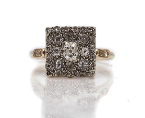 A 9CT WHITE GOLD AND DIAMOND SQUARE CLUSTER RINGMounted with cushion shaped and circular cut diamonds and with the principal 