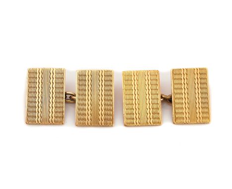 A PAIR OF GOLD RECTANGULAR CUFFLINKSThe backs and the fronts with engine turned decoration, detailed 9CT, weight 6.4 gms.