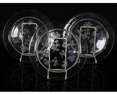 THREE LALIQUE `MUGUET' PATTERN SALAD PLATESPost 1945 Each moulded on the underside with lily of the valley, signed Lalique Fr