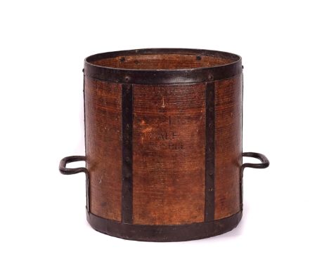 AN IRON BOUND BENTWOOD HALF BUSHELL GRAIN MEASURE AND WOOL COMBEarly 20th CenturyHeight of measure 30.5cm, diameter 29cm, len