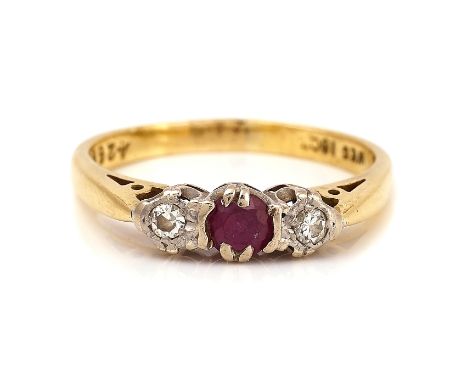 A GOLD, RUBY AND DIAMOND THREE STONE RINGClaw set with a circular cut ruby between two circular cut diamonds, detailed 18CT, 