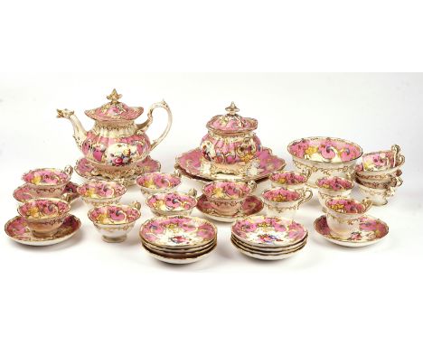 A COALPORT PINK-GROUND PART TEA AND COFFEE SERVICECirca 1840Each piece painted with flower groups, comprising; teapot, cover 