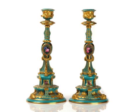 A PAIR OF RUSSIAN PORCELAIN CANDLESTICKSImperial Porcelain Factory, reign of Alexander IIEach painted in turquoise green and 