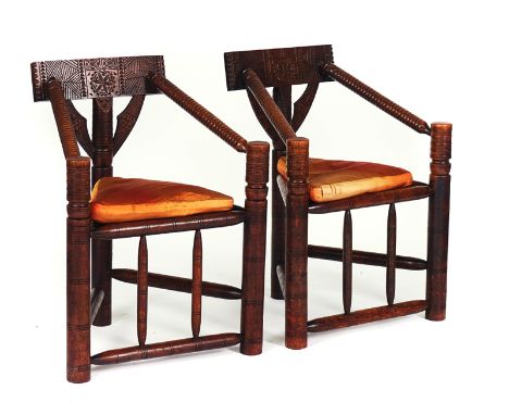 A PAIR OF 17TH CENTURY STYLE OAK TURNER'S CHAIRS (2)With carved backs and turned supports  65cm wide; 88cm highCondition repo
