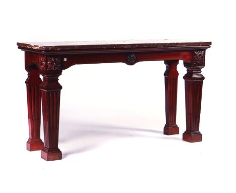 IN THE MANNER OF WILLIAM KENT; A 19TH CENTURY CONSOLE TABLEThe rectangular marble top on four fluted tapering square supports