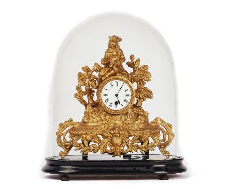 A FRENCH GILT-METAL MANTEL CLOCKLate 19th CenturyThe 3 inch white enamel dial with Roman numerals, surmounted by a musician p