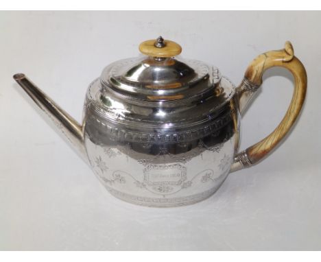 A Regency silver oval teapot with damaged ivory handle having presentation inscription 'Hillbrow July 1870', CF London 1800, 