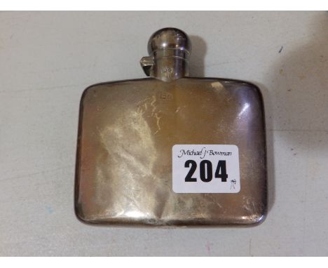 A Chester silver hip flask.