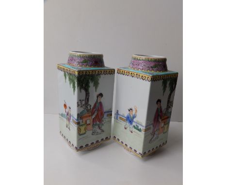 A pair of 20thC Chinese polychrome square vases, decorated with figures on terraces, pink & turquoise borders, red printed se