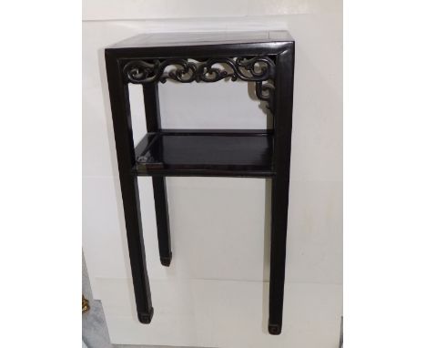 A Chinese two tier square table (possibly zitan) of rectangular plan, Height 32”, Width 16”, Depth 12” - one of the open scro