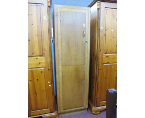 A Light Oak Hall Wardrobe, having ironing board to deep door, 53cm wide,