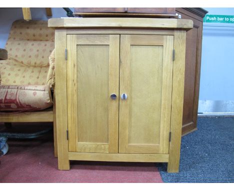 A Light Wood Two Door Cupboard, 70 cm wide.