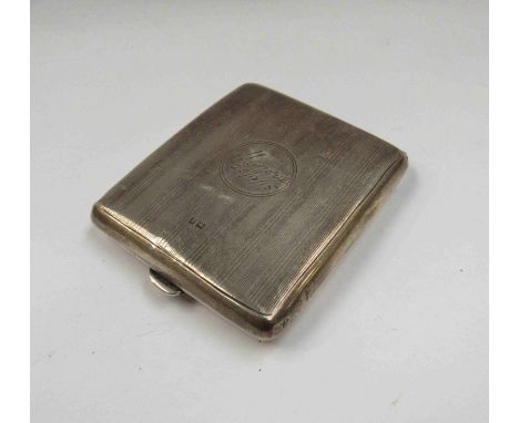 A silver cased travel clock in form of a cigarette case, enamel dial a/f