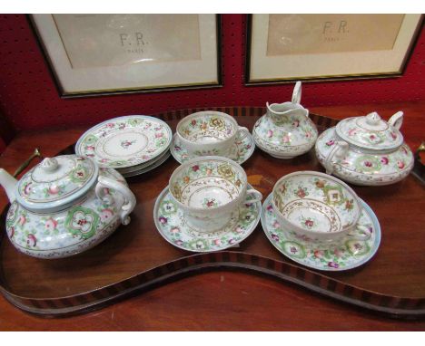 A kidney shaped galleried tray with twin brass handles, a/f, 62cm long and a floral design teaset comprising of three trios, 