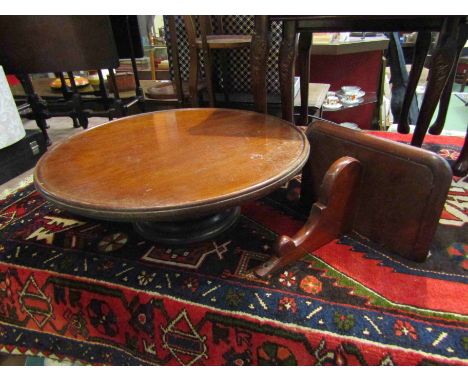 A mahogany Lazy Susan with dished top and a wall bracket