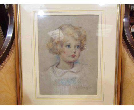 E.M. JESSOP: An early 20th Century pastel portrait of a young child, framed and glazed, 31cm x 24cm 