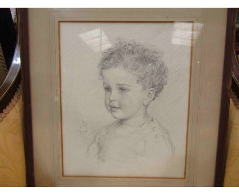 Portrait in pencil of a small child, monogrammed JR, framed and glazed, 33cm x 26cm