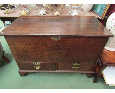 A late Georgian oak mule chest with two drawers on bracket feet, 114cm long x 58cm deep x 78cm tall