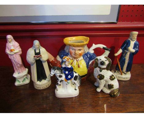 Four Staffordshire figures, dog and Toby man teapot (6)