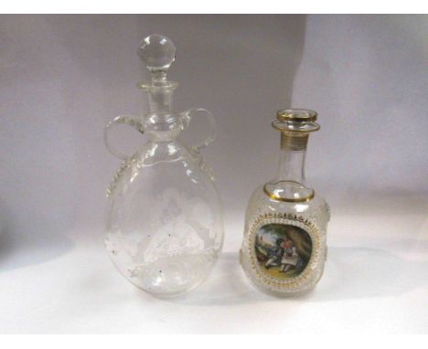 Two Victorian continental decanters, one with hand painted enamel plaque