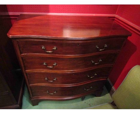 A George III revival mahogany serpentine front chest of four long drawers on bracket feet, 90cm x 44cm x 90cm