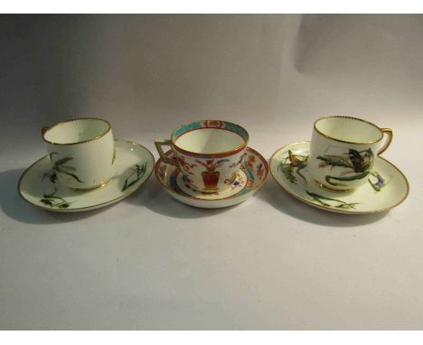 Two Victorian George Jones butterfly cups and saucers and a Minton cup and saucer