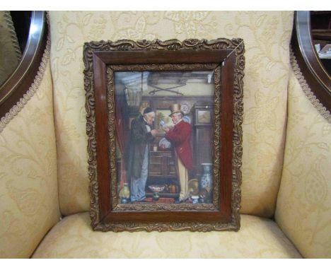 An ornate gilt frame with print depicting gentlemen collecting