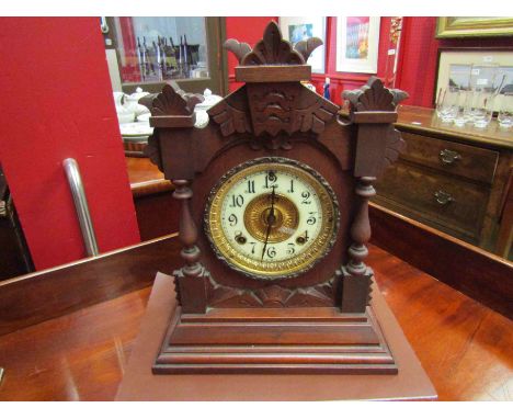 An American Ansonia 8 day striking mantel clock in mahogany case (with key)