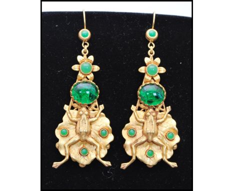 A pair of vintage signed Askew of London gold-tone figural earrings in the form of frogs set upon lilly pads set with emerald