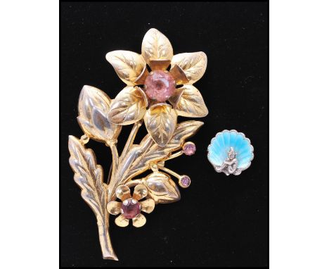 A 1950s oversized gold washed sterling silver flower spray brooch marked Sterling together with a vintage silver and blue ena