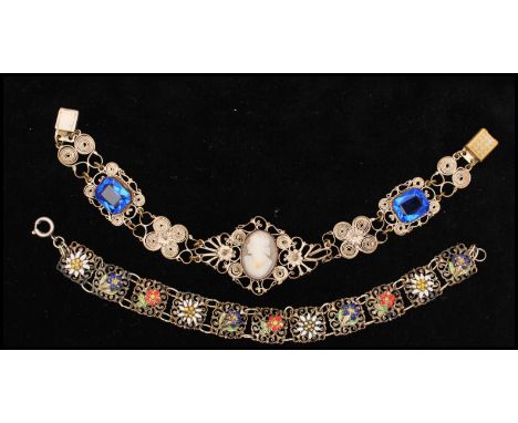 Two 1930s Czech bracelets one rhinestone and cameo the other having enamel flower design. Cameo bracelet measures 8 inches, t